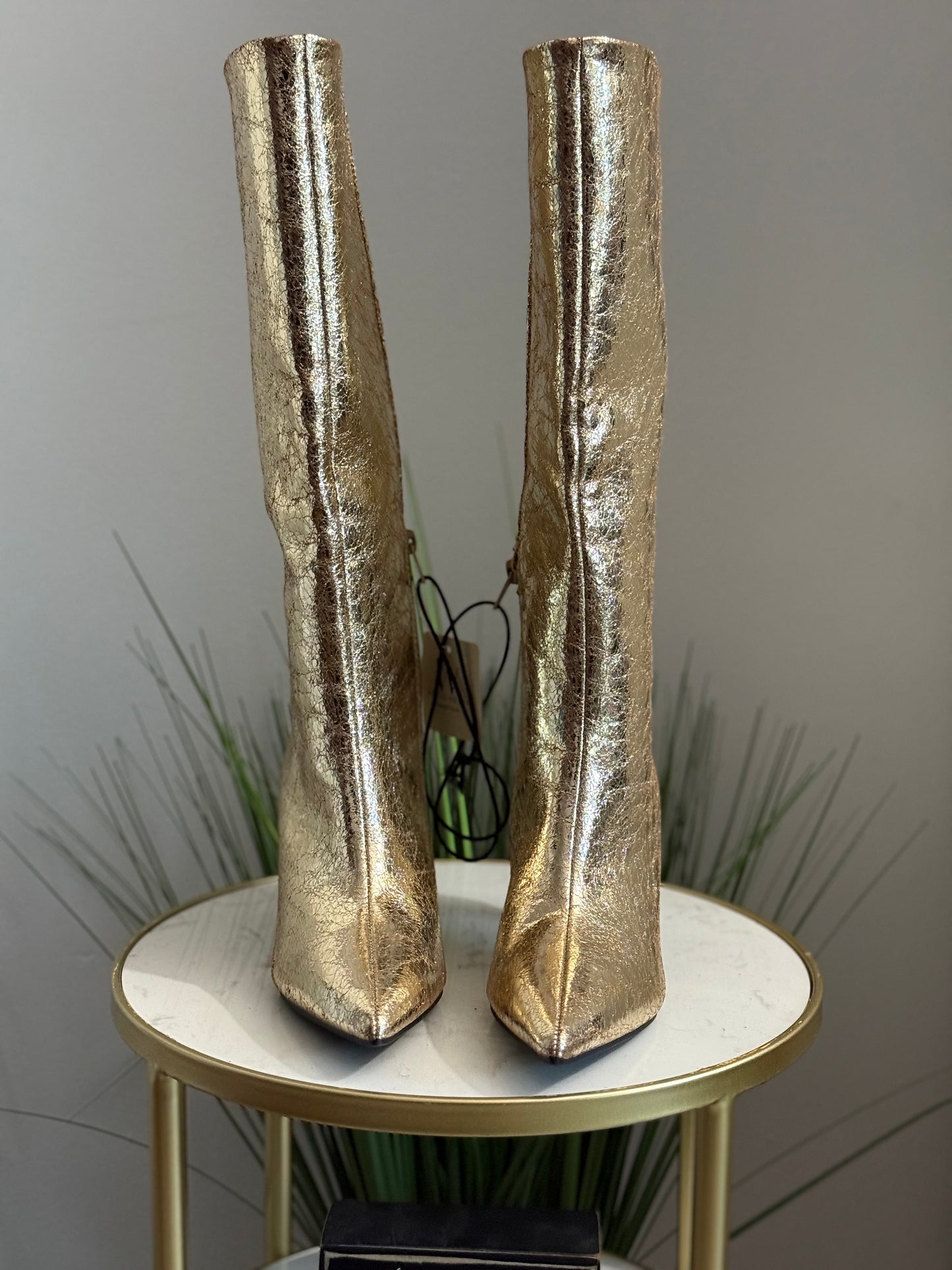 #210 Golden Boots