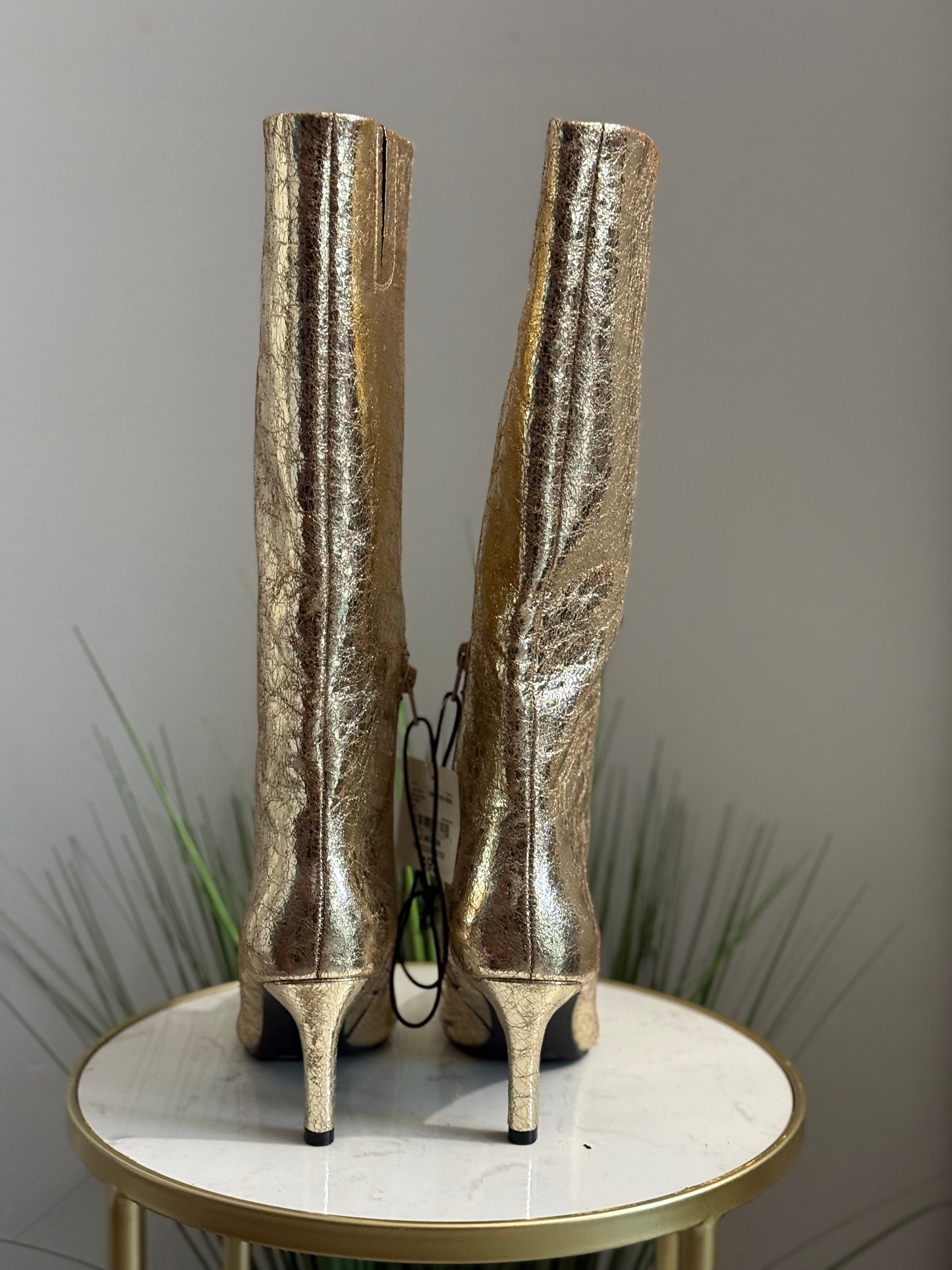#210 Golden Boots