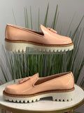 Patent leather tassel loafers
